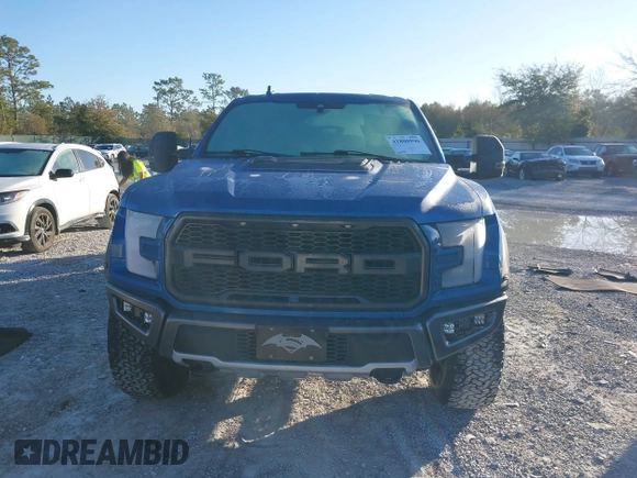 2020 Ford F-150 Raptor with VIN 1FTFW1RG6LFA91517, listed as a IAAI auction lot 41800990 with 112,535 mi miles and . Bid and sale history available at carsss.com. Image 13.