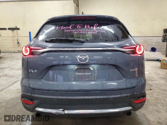 2021 Mazda CX-9 Carbon Edition with VIN JM3TCADY2M0527657, listed as a Copart auction lot 46650145 with 69,439 mi miles and Salvage title. Bid and sale history available at DreamBid. Image 6.