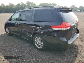 2013 Toyota Sienna XLE AAS with VIN 5TDYK3DCXDS333750, listed as a Copart auction lot 60894295 with 154,400 mi miles and Salvage title. Bid and sale history available at DreamBid. Image 2.