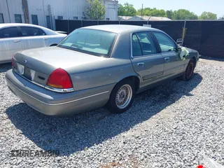 1999 Ford Crown Victoria LX с VIN 2FAFP74W8XX160853, выставлен на аукционе IAAI как лот 41987108 с пробегом 100 582 миль миль и . История ставок и продаж доступна на DreamBid. Изображение 4.