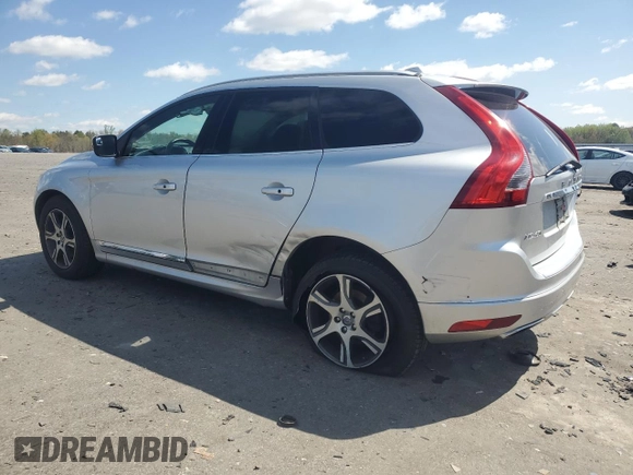 2014 Volvo XC60 R-Design Premier Plus z VIN YV4902DZ1E2543491, wystawiony jako Copart lot #51699955 z przebiegiem 114 688 mil mil oraz Szkoda całkowita • Salvage title. Historia ofert i sprzedaży dostępna na DreamBid. Obrazek 2.
