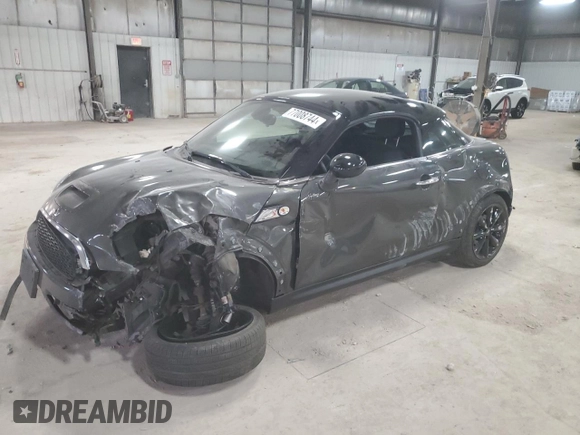 2012 MINI Coupe S z VIN WMWSX3C51CT408195, wystawiony jako Copart lot #77008744 z przebiegiem Nie podano mil oraz Szkody całkowita. Historia ofert i sprzedaży dostępna na DreamBid. Obrazek 1.