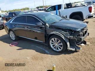 2013 Cadillac XTS Luxury z VIN 2G61P5S35D9172074, wystawiony jako Copart lot #71996124 z przebiegiem 122 338 mil mil oraz Szkoda całkowita • Salvage title. Historia ofert i sprzedaży dostępna na DreamBid. Obrazek 4.