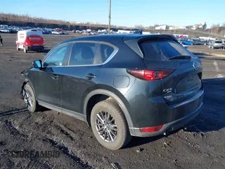 2021 Mazda CX-5 Touring with VIN JM3KFBCM2M1303063, listed as a IAAI auction lot 41814604 with 36,116 mi miles. Bid and sale history available at carsss.com. Image 3.