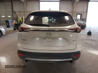 2017 Mazda CX-9 Grand Touring with VIN JM3TCADY5H0132572, listed as a IAAI auction lot 41421008 with 66,656 mi miles and . Bid and sale history available at DreamBid. Image 16.