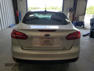 2018 Ford Focus SE z VIN 1FADP3FE9JL234158, wystawiony jako Copart lot #51788755 z przebiegiem 99 877 mil mil oraz Szkoda całkowita • Salvage title. Historia ofert i sprzedaży dostępna na DreamBid. Obrazek 6.