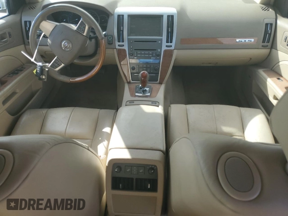 2010 Cadillac STS AWD z VIN 1G6DU6EV9A0138248, wystawiony jako Copart lot #85649154 z przebiegiem 137 227 mil mil oraz Nie do naprawy • Non repairable. Historia ofert i sprzedaży dostępna na DreamBid. Obrazek 8.
