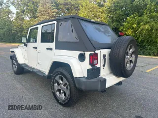 2016 Jeep Wrangler Unlimited Sahara with VIN 1C4BJWEG5GL215915, listed as a Copart auction lot 61690145 with 143,925 mi miles and Clean title. Bid and sale history available at DreamBid. Image 3.