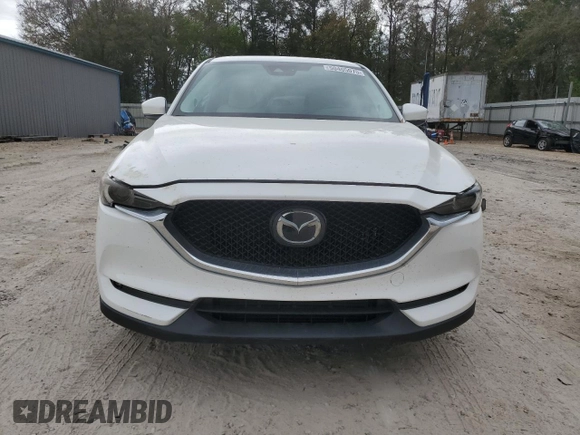 2021 Mazda CX-5 Grand Touring Reserve with VIN JM3KFBAY5M0320404, listed as a Copart auction lot 50405075 with 32,596 mi miles and Salvage Title. Bid and sale history available at carsss.com. Image 5.