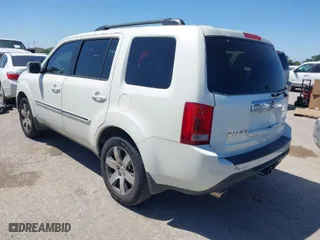 2013 Honda Pilot Touring with VIN 5FNYF4H96DB067995, listed as a IAAI auction lot 41977403 with 129,223 mi miles. Bid and sale history available at carsss.com. Image 3.