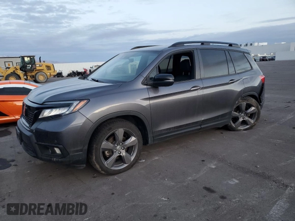 2021 Honda Passport Touring with VIN 5FNYF8H93MB006966, listed as a Copart auction lot 84738884 with 48,467 mi miles and Salvage Title. Bid and sale history available at carsss.com. Image 1.