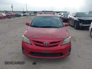 2011 Toyota Corolla L with VIN 2T1BU4EE2BC601203, listed as a IAAI auction lot 41913651 with 180,942 mi miles. Bid and sale history available at carsss.com. Image 6.