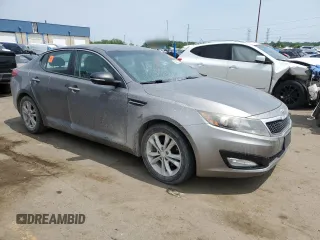 2013 Kia Optima EX z VIN 5XXGN4A74DG090437, wystawiony jako Copart lot #60822225 z przebiegiem 138 596 mil mil oraz Czysty tytuł • Clean title. Historia ofert i sprzedaży dostępna na DreamBid. Obrazek 4.