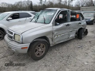 2004 Chevrolet Tracker LT z VIN 2CNBE634446902199, wystawiony jako Copart lot #89174685 z przebiegiem Nie podano mil oraz Szkoda całkowita • Salvage title. Historia ofert i sprzedaży dostępna na DreamBid. Obrazek 1.