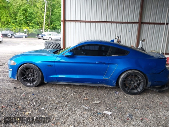 2021 Ford Mustang GT с VIN 1FA6P8CF4M5125666, выставлен на аукционе IAAI как лот 42192986 с пробегом 63 667 миль миль и . История ставок и продаж доступна на DreamBid. Изображение 14.