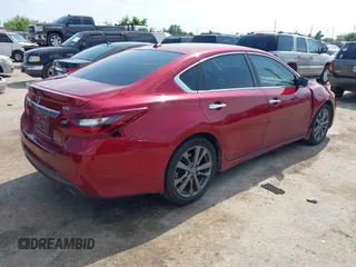2018 Nissan Altima SR with VIN 1N4AL3AP9JC195613, listed as a IAAI auction lot 42131986 with 83,256 mi miles and . Bid and sale history available at carsss.com. Image 4.