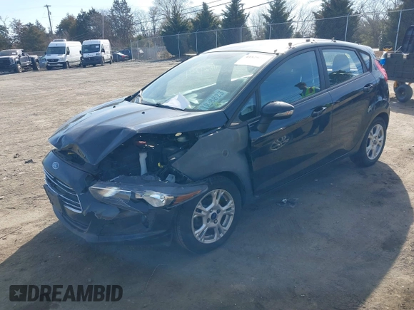 2016 Ford Fiesta SE with VIN 3FADP4EJ5GM153945, listed as a IAAI auction lot 41829241 with 157,597 mi miles. Bid and sale history available at carsss.com. Image 17.