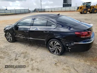 2014 Volkswagen CC R-Line with VIN WVWBP7AN9EE501261, listed as a Copart auction lot 75701194 with 73,123 mi miles and Salvage Title. Bid and sale history available at carsss.com. Image 2.