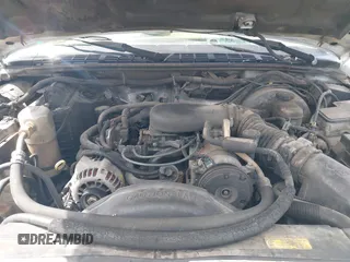 1999 Chevrolet Blazer Trailblazer z VIN 1GNDT13W4X2208791, wystawiony jako IAAI lot #42281876 z przebiegiem 261 605 mil mil oraz . Historia ofert i sprzedaży dostępna na DreamBid. Obrazek 10.