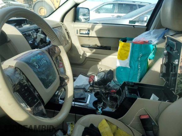 2010 Ford Escape Limited with VIN 1FMCU9E77AKD23121, listed as a Copart auction lot 50243295 with Not provided miles and Salvage title. Bid and sale history available at DreamBid. Image 8.