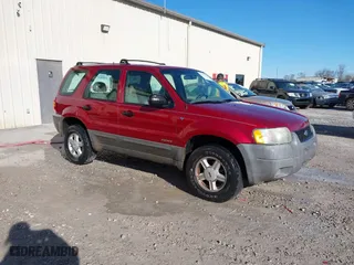 2001 Ford Escape XLS with VIN 1FMYU01171KD93513, listed as a IAAI auction lot 41767869 with 148,940 mi miles. Bid and sale history available at carsss.com. Image 1.