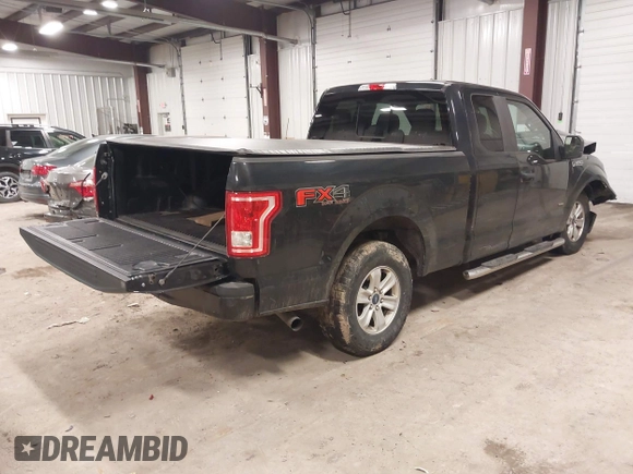 2015 Ford F-150 XLT with VIN 1FTEX1EP8FFC36723, listed as a IAAI auction lot 41738159 with 118,521 mi miles. Bid and sale history available at carsss.com. Image 4.