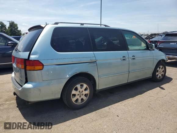 2004 Honda Odyssey EX-L with VIN 5FNRL18014B015462, listed as a Copart auction lot 62834665 with 323,817 mi miles and Salvage title. Bid and sale history available at DreamBid. Image 3.