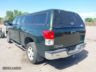 2010 Toyota Tundra 4WD Truck with VIN 5TFUW5F11AX103188, listed as a IAAI auction lot 39811998 with 198,948 mi miles. Bid and sale history available at carsss.com. Image 3.