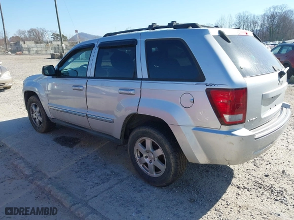 2010 Jeep Grand Cherokee Laredo with VIN 1J4PS4GKXAC103153, listed as a IAAI auction lot 41760743 with 185,138 mi miles. Bid and sale history available at carsss.com. Image 3.