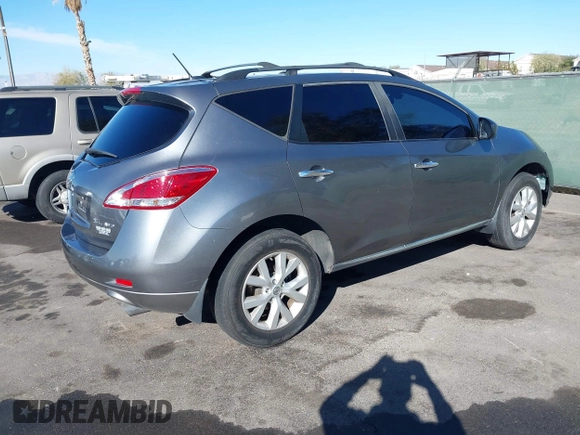 2013 Nissan Murano LE with VIN JN8AZ1MW7DW322852, listed as a IAAI auction lot 41574118 with 128,449 mi miles and . Bid and sale history available at DreamBid. Image 4.