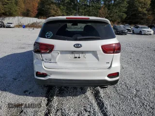 2020 Kia Sorento LX z VIN 5XYPG4A54LG620991, wystawiony jako Copart lot #83208104 z przebiegiem 77 189 mil mil oraz Szkoda całkowita • Salvage title. Historia ofert i sprzedaży dostępna na DreamBid. Obrazek 6.