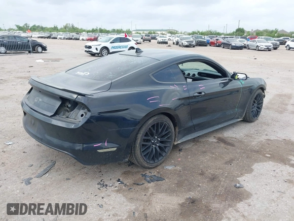 2021 Ford Mustang GT with VIN 1FA6P8CF8M5137318, listed as a IAAI auction lot 41934683 with 62,473 mi miles and . Bid and sale history available at DreamBid. Image 4.