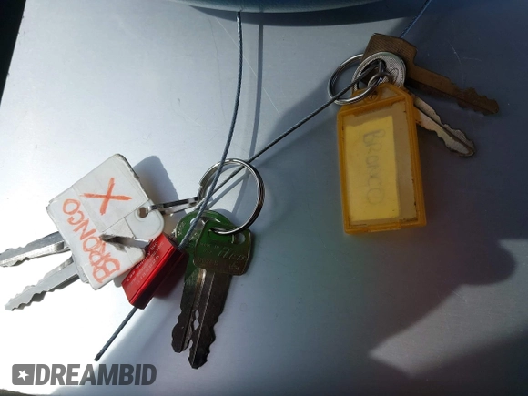 1986 Ford Bronco z VIN 1FMCU14T0GUC51692, wystawiony jako IAAI lot #41982392 z przebiegiem 509 734 mil mil oraz . Historia ofert i sprzedaży dostępna na DreamBid. Obrazek 11.
