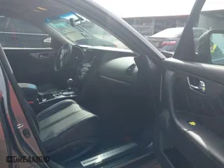 2014 Infiniti QX70 with VIN JN8CS1MW2EM412582, listed as a IAAI auction lot 41449958 with 100,115 mi miles. Bid and sale history available at carsss.com. Image 5.