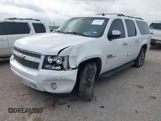 2011 Chevrolet Suburban LT with VIN 1GNSCJE05BR392834, listed as a IAAI auction lot 42141087 with 251,359 mi miles and . Bid and sale history available at DreamBid. Image 18.