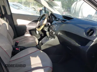 2012 Mazda 5 Grand Touring with VIN JM1CW2DL5C0134521, listed as a IAAI auction lot 42138375 with 227,485 mi miles and . Bid and sale history available at DreamBid. Image 5.