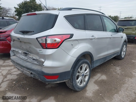 2018 Ford Escape SE with VIN 1FMCU0GD7JUB75362, listed as a IAAI auction lot 41320189 with 67,194 mi miles. Bid and sale history available at carsss.com. Image 4.
