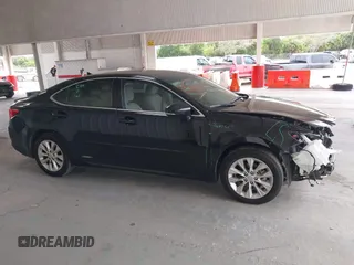 2014 Lexus ES 300h with VIN JTHBW1GG9E2043696, listed as a IAAI auction lot 42392424 with 74,370 mi miles and . Bid and sale history available at DreamBid. Image 14.