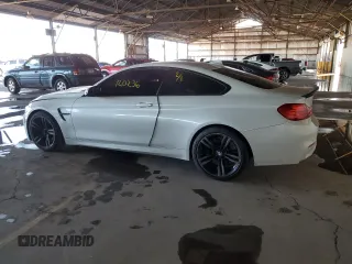 2015 BMW M4 with VIN WBS3R9C59FK332331, listed as a Copart auction lot 39366133 with 120,236 mi miles. Bid and sale history available at carsss.com. Image 2.