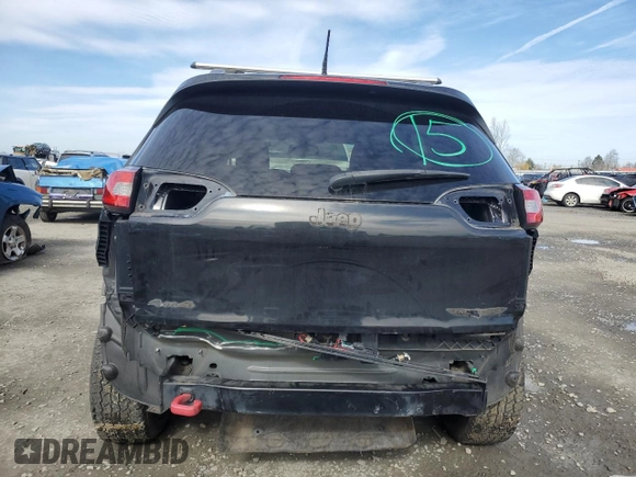 2014 Jeep Cherokee Trailhawk with VIN 1C4PJMBS9EW159993, listed as a Copart auction lot 46935105 with 128,140 mi miles and Salvage Title. Bid and sale history available at carsss.com. Image 6.