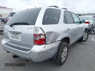 2005 Acura MDX Touring with VIN 2HNYD18955H558360, listed as a IAAI auction lot 41738503 with 153,461 mi miles. Bid and sale history available at carsss.com. Image 4.