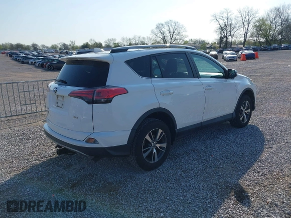 2018 Toyota RAV4 XLE with VIN 2T3WFREV2JW412970, listed as a IAAI auction lot 41986122 with 61,828 mi miles. Bid and sale history available at carsss.com. Image 4.
