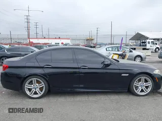 2015 BMW 5 Series 535i with VIN WBA5B1C55FG128387, listed as a IAAI auction lot 41885806 with 94,734 mi miles and . Bid and sale history available at carsss.com. Image 18.