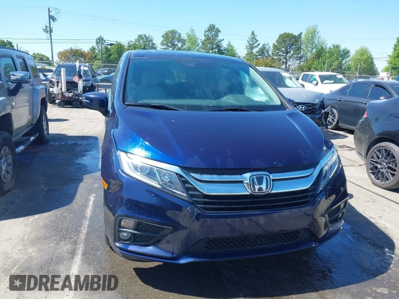 2019 Honda Odyssey EX-L with VIN 5FNRL6H78KB096922, listed as a IAAI auction lot 42008685 with 116,723 mi miles and . Bid and sale history available at DreamBid. Image 12.