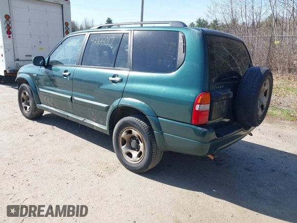 2002 Suzuki XL-7 Standard with VIN JS3TX92V124124409, listed as a IAAI auction lot 42166017 with 194,418 mi miles. Bid and sale history available at carsss.com. Image 3.