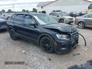 2021 Volkswagen Tiguan SE z VIN 3VV2B7AX4MM111887, wystawiony jako IAAI lot #42290153 z przebiegiem 75 773 mil mil oraz . Historia ofert i sprzedaży dostępna na DreamBid. Obrazek 1.