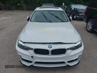 2013 BMW 3 Series 328i xDrive with VIN WBA3B5C5XDJ598557, listed as a IAAI auction lot 42747733 with 153,989 mi miles and . Bid and sale history available at DreamBid. Image 6.
