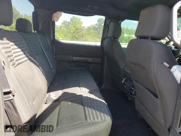 2023 Ford F-150 XL with VIN 1FTEW1EP5PKD03418, listed as a Copart auction lot 58406895 with 58,539 mi miles and Clean title. Bid and sale history available at DreamBid. Image 10.