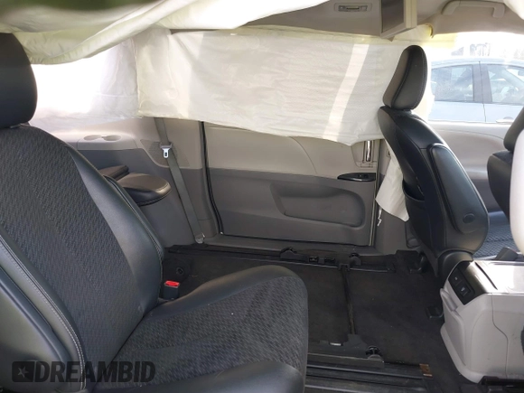 2014 Toyota Sienna SE with VIN 5TDXK3DC2ES472249, listed as a IAAI auction lot 41402101 with Not Provided miles and . Bid and sale history available at DreamBid. Image 8.