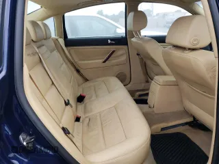 2004 Volkswagen Passat GLX z VIN WVWRH63B94P150234, wystawiony jako Copart lot #54092825 z przebiegiem 89 149 mil mil oraz Czysty tytuł • Clean title. Historia ofert i sprzedaży dostępna na DreamBid. Obrazek 10.